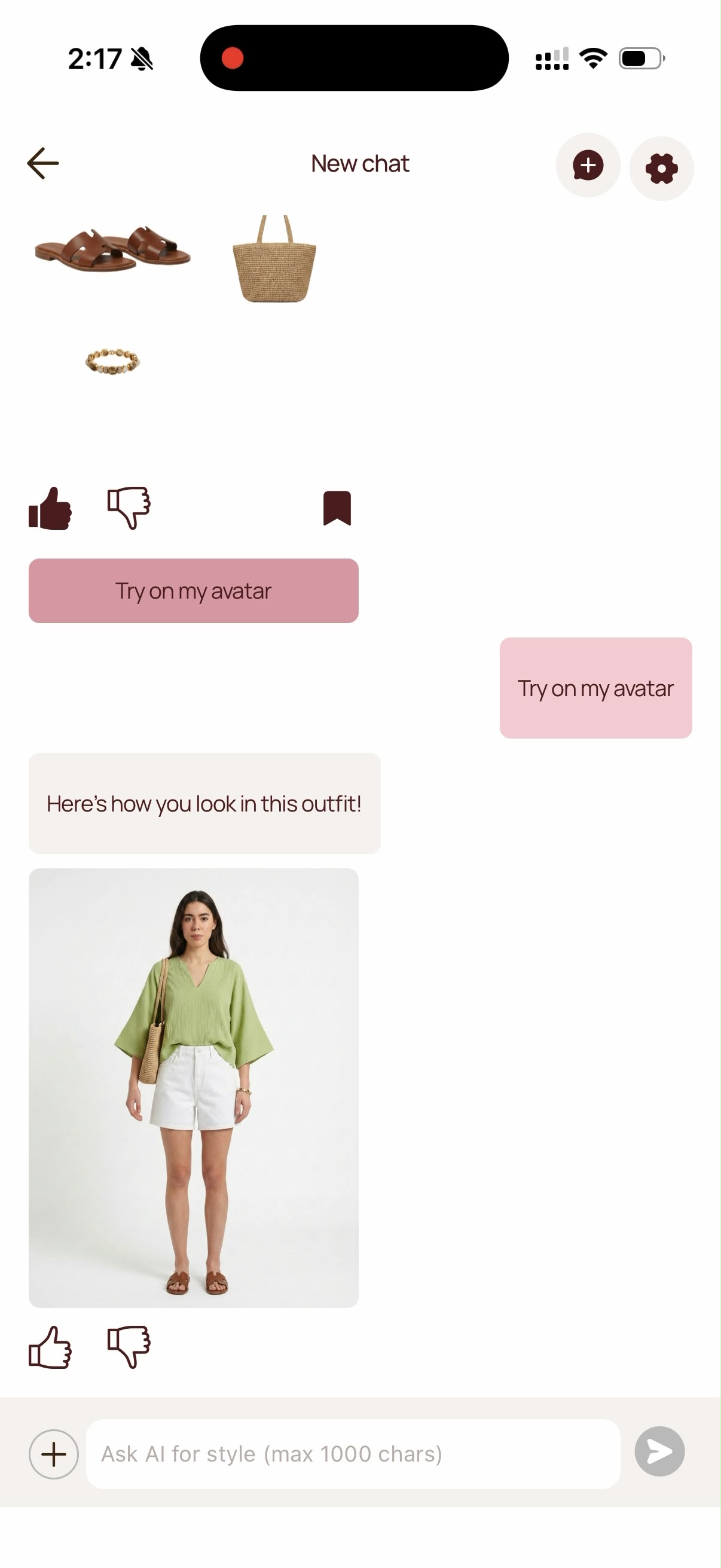 El Probador dentro de una conversación con el Portal Stylist: tras pedir probarse el look en su avatar, Portal responde con una foto de cuerpo entero del avatar de la propia usuaria llevándolo puesto — blusa verde salvia, pantalón corto vaquero blanco, sandalias de piel color caramelo y capazo de rafia.